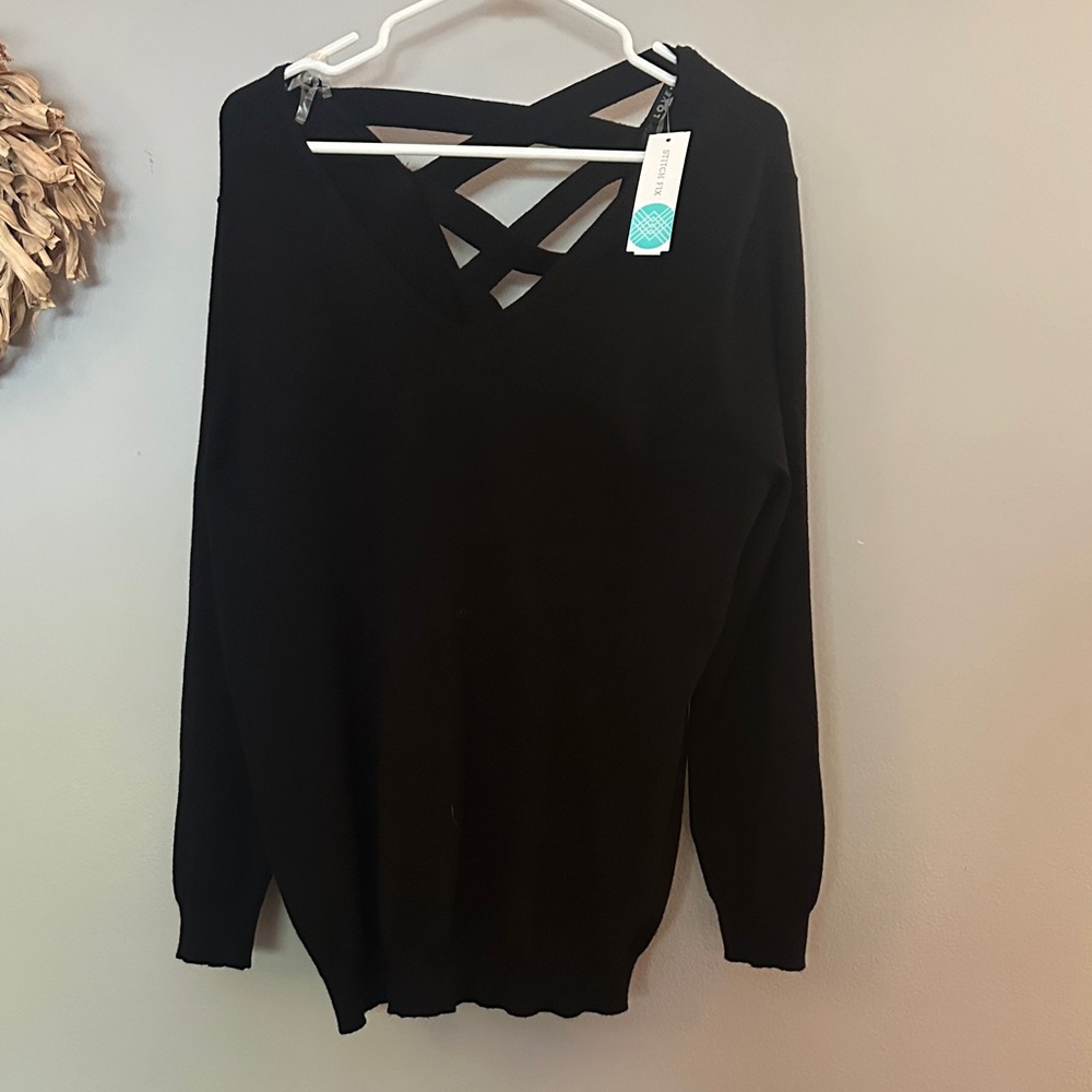 Elegant Black V-Neck Sweater with Crisscross Detail
